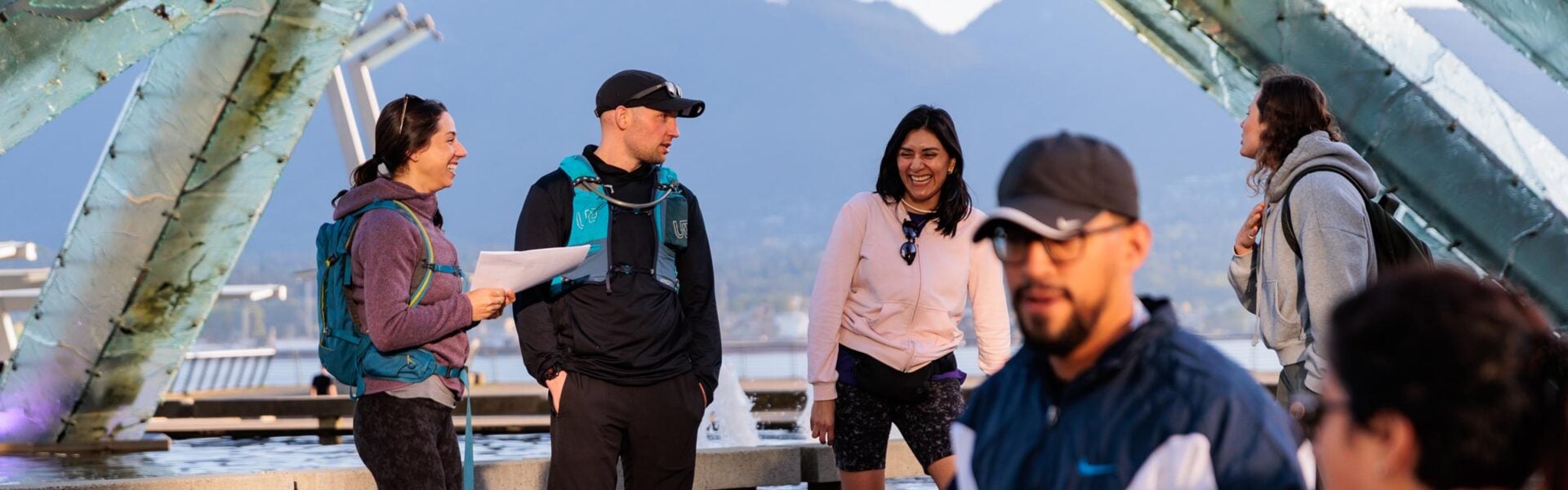 Attendees gathered & laughing before a morning run